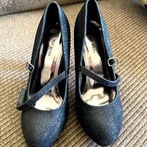 Black shimmery high heels